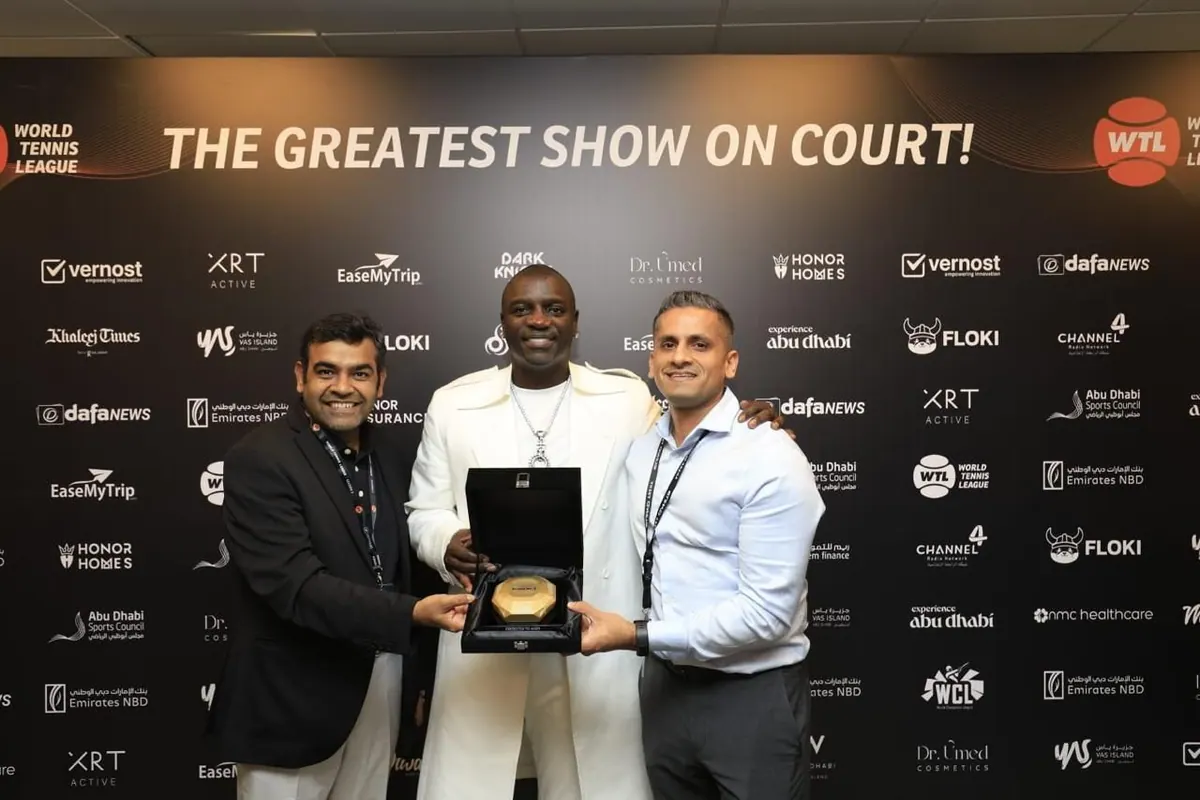 Trophy presented on stage at a sporting awards event
