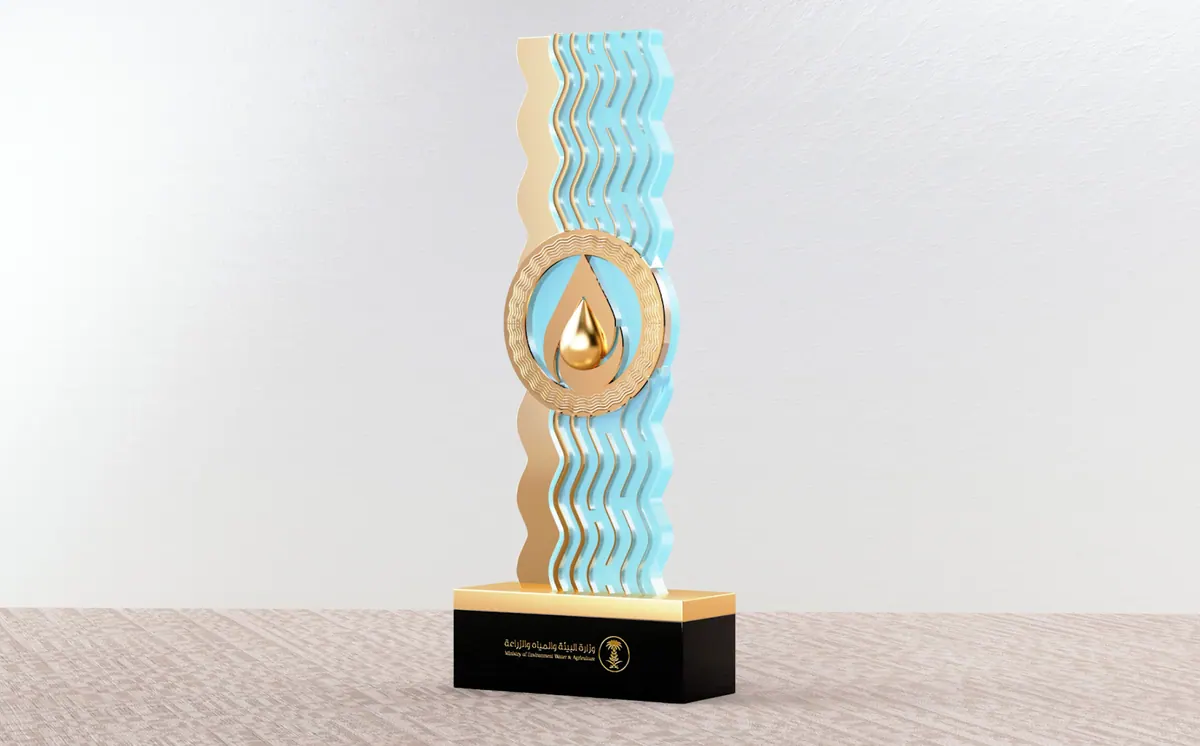 Turquoise textured column award with a gold medallion