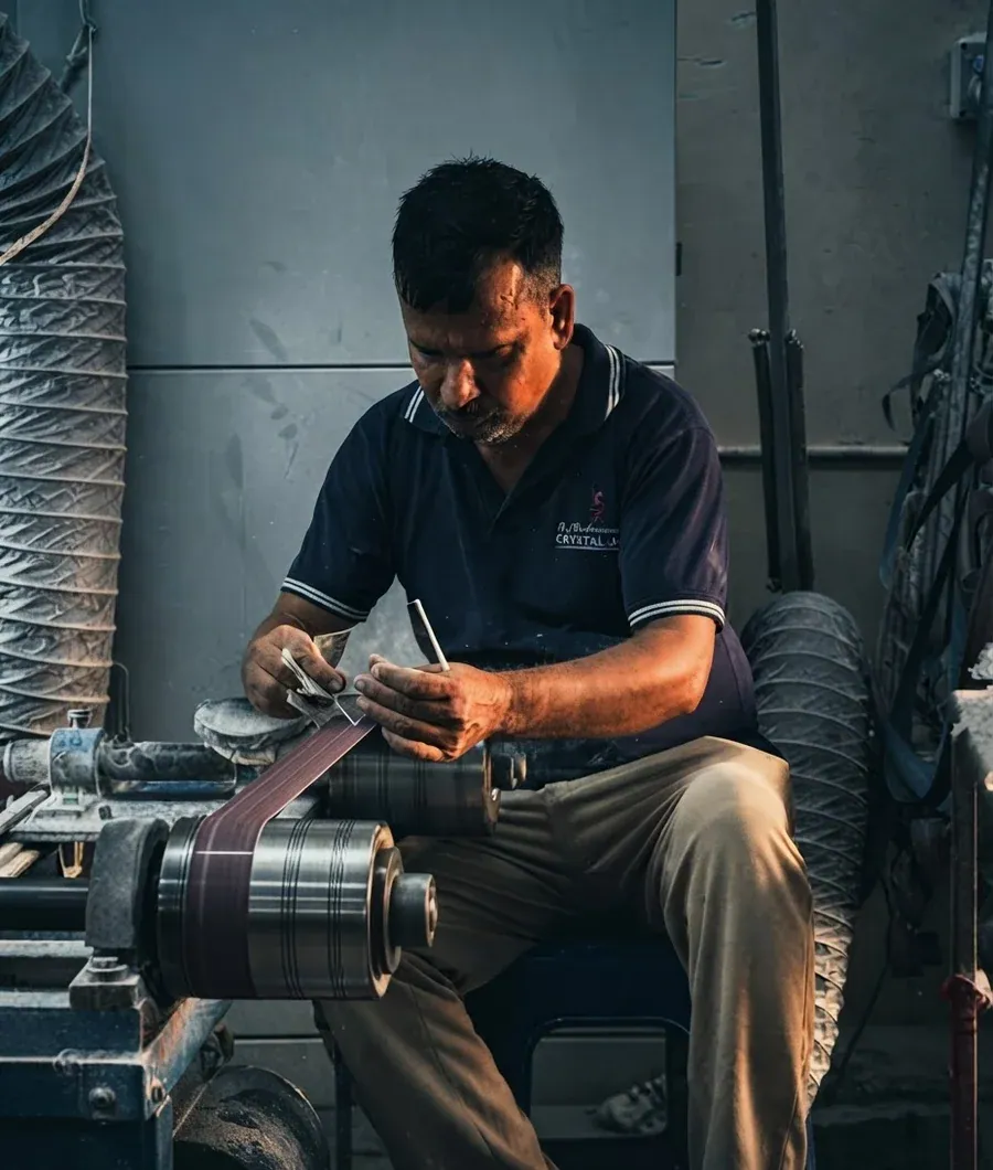Crystal Arc craftsperson at work, UAE facility