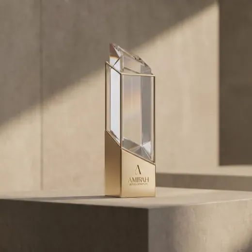 Clear geometric award with a gold base