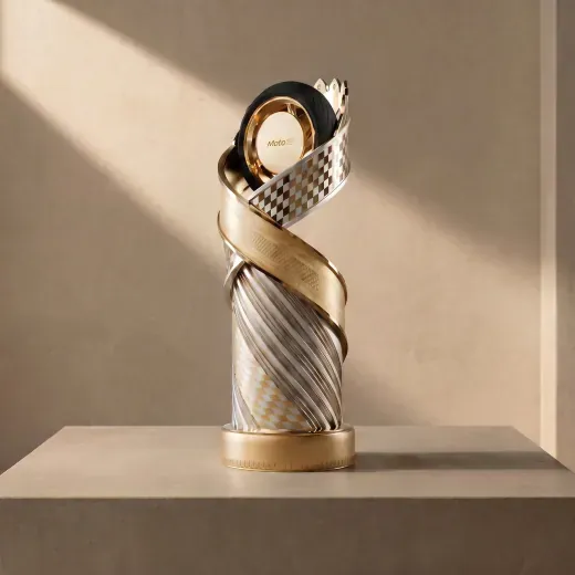 Spiral silver trophy with a circular gold detail