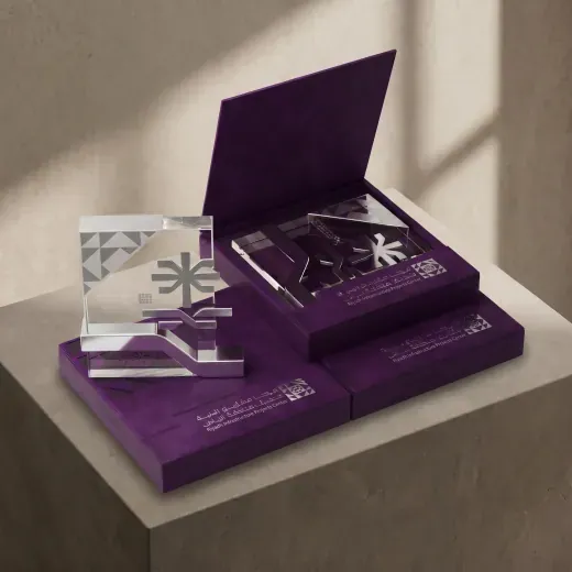 Crystal presentation pieces in purple lined gift boxes