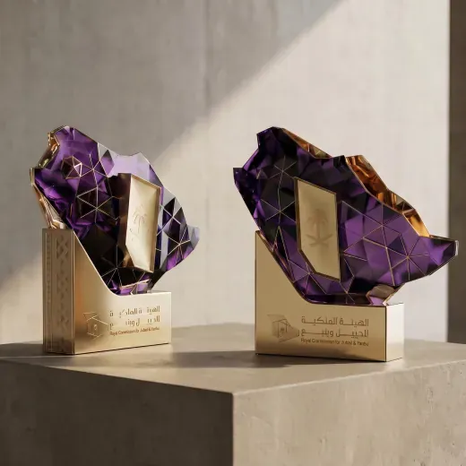 Purple faceted awards on gold bases